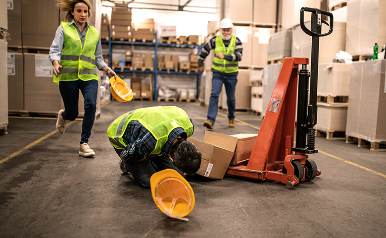 Complacent worker after an incident in a warehouse