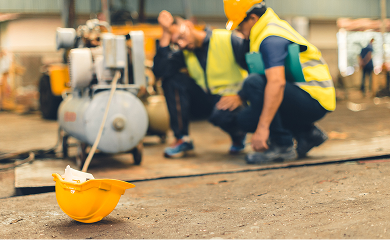 blur accident in workplace team friend help support for injury and safety for machinery heavy industry worker concept